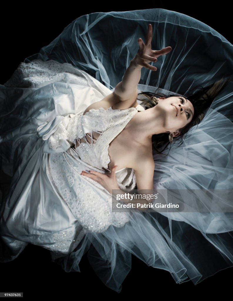 Dancer wearing gown in elegant pose
