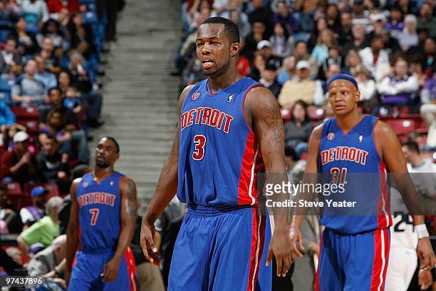 Ben Gordon, Rodney Stuckey and Charlie Villanueva of the Detroit Pistons walk on the court during the game against the Sacramento Kings on February...