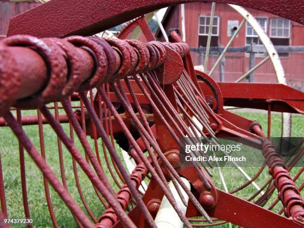 old farm machinery - laufmasche stock-fotos und bilder