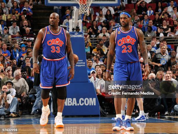 Shaquille O'Neal and LeBron James of the Cleveland Cavaliers walks down the court during the game against the Orlando Magic on February 21, 2010 at...