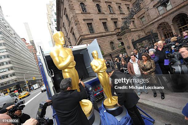 Personality Sherri Shepherd watches as the two eight-foot golden Oscar statues are delivered for the official Academy of Motion Picture Arts and...