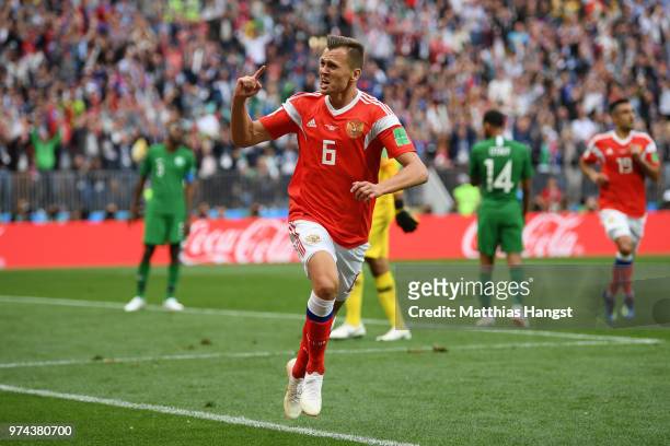Denis Cheryshev of Russia celebrates after scoring his team's second goal during the 2018 FIFA World Cup Russia Group A match between Russia and...