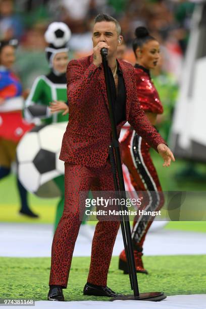 British popstar Robbie Williams performs during the opening ceremony prior to the 2018 FIFA World Cup Russia Group A match between Russia and Saudi...