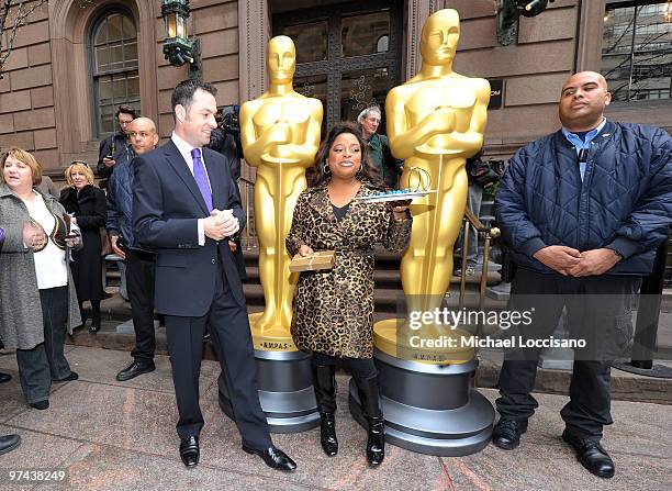 Stephane Lacroix of the New York Palace hotel's GILT restaurant gives TV personality Sherri Shepherd sapphire tinted chocolate truffles to taste as...
