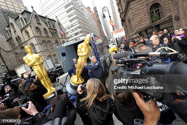 General view of the two eight-foot golden Oscar statues delivered for the official Academy of Motion Picture Arts and Sciences New York Oscar night...
