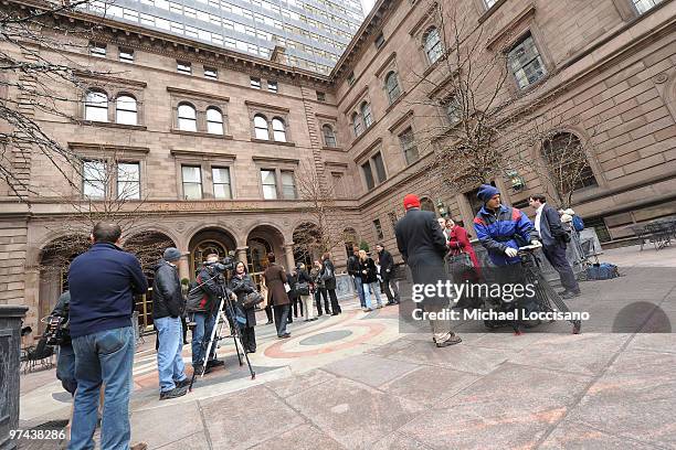 General view of media gathered outside while waiting for two eight-foot golden Oscar statues delivered for the official Academy of Motion Picture...