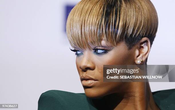 Singer Rihanna from Barbados poses for photographers as she arrives on the red carpet for the "Echo" music awards in Berlin on March 4, 2010. AFP...