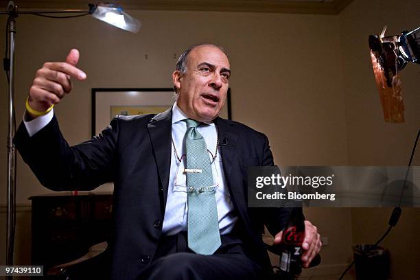 Muhtar Kent, chairman and chief executive officer of Coca-Cola Co., holds a bottle of Coca-Cola Zero during an interview in New York, U.S., on...