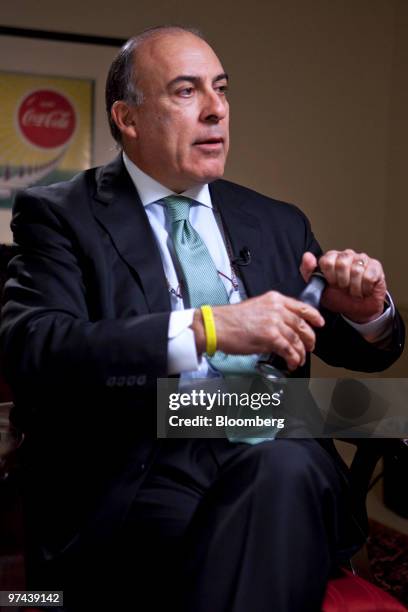 Muhtar Kent, chairman and chief executive officer of Coca-Cola Co., opens a bottle of Coca-Cola Zero during an interview in New York, U.S., on...