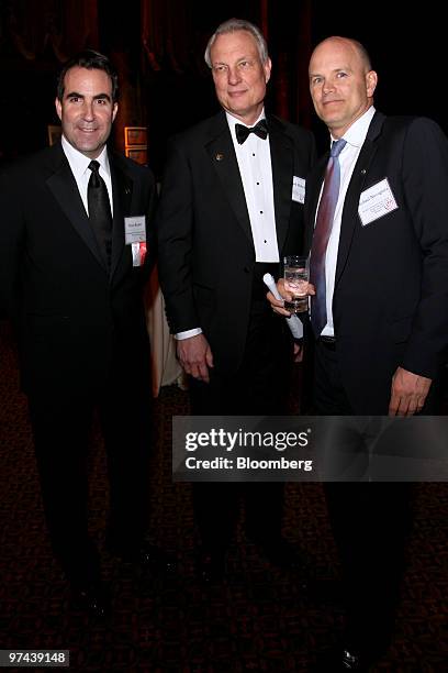 Michael E. Novogratz, founder and president of Fortress Investment Group LLC, right, Richard H. Baker, president and chief executive officer of the...