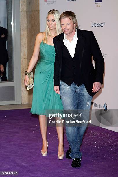 Former FC Bayern goalkeeper Oliver Kahn and model Svenja arrive at the Echo Award 2010 at Messe Berlin on March 4, 2010 in Berlin, Germany.