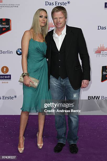 Oliver Kahn and partner Svenja arrive for the Echo award 2010 at Messe Berlin on March 4, 2010 in Berlin, Germany.