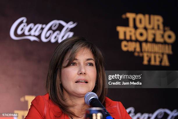 Maria Eugenia del Rio, Director of Coca-Cola Mexico, speaks during the opening of the Fifa World Cup Trophy exhibition at Coca-Cola headquarters as...