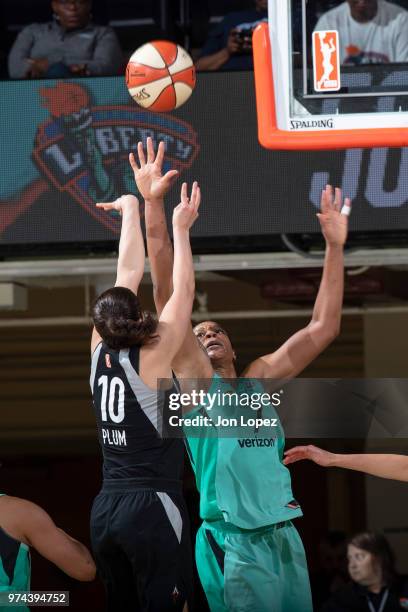 Kelsey Plum of the Las Vegas Aces shoots the ball against Kia Vaughn of the New York Liberty during the game on June 13, 2018 at Westchester County...