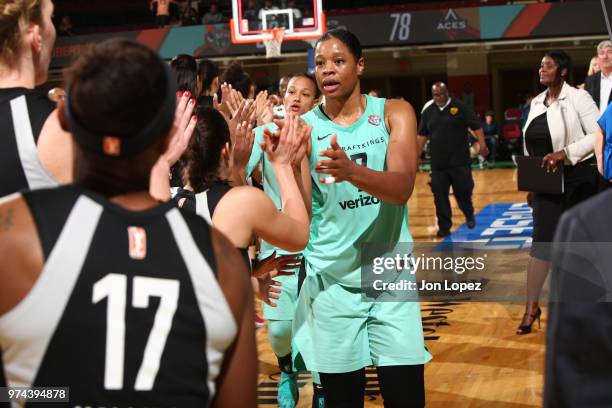 Kia Vaughn of the New York Liberty exchanges handshakes with the Las Vegas Aces after the game on June 13, 2018 at Westchester County Center in White...