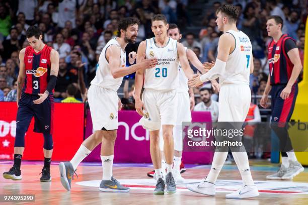 Real Madrid Sergio Llull, Jaycee Carroll and Luka Doncic during Liga Endesa Finals match between Real Madrid and Kirolbet Baskonia at Wizink Center...