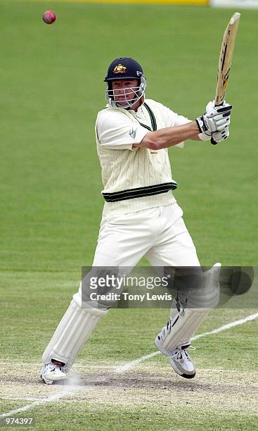 Mark Waugh of Australia cuts through point against the West Indies during the third days play of the Third Test match at the Adelaide Oval in...