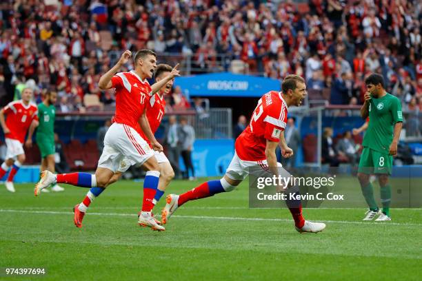 Artem Dzyuba of Russia celebrates after scoring his team's third goal during the 2018 FIFA World Cup Russia Group A match between Russia and Saudi...