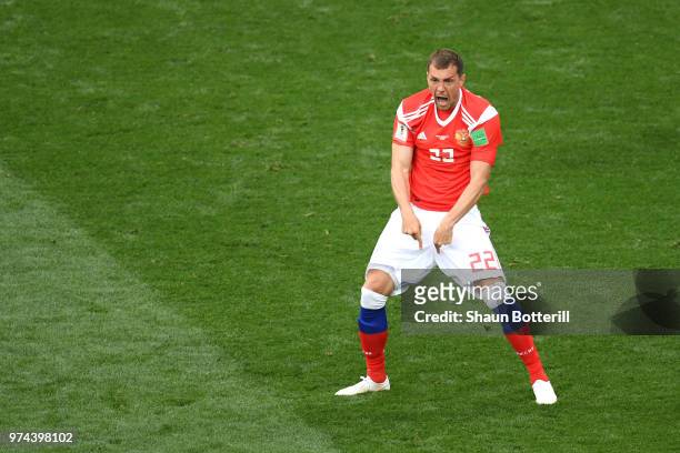 Artem Dzyuba of Russia celebrates after scoring his team's third goal during the 2018 FIFA World Cup Russia Group A match between Russia and Saudi...