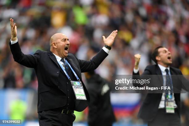 Stanislav Cherchesov, Head Coach of Russia celebrates after his team's third goal during the 2018 FIFA World Cup Russia Group A match between Russia...