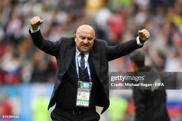 Stanislav Cherchesov, Head Coach of Russia celebrates after his team's third goal during the 2018 FIFA World Cup Russia Group A match between Russia...