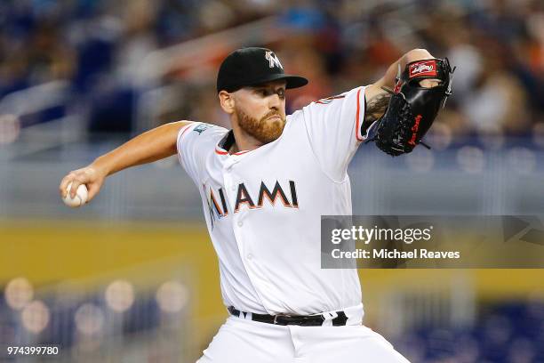 Dan Straily of the Miami Marlins delivers a pitch in the first inning against the San Francisco Giants at Marlins Park on June 14, 2018 in Miami,...