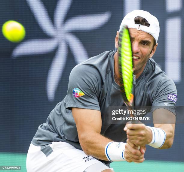 Tunisia's Malek Jaziri returns the ball to his Greece's Stefanos Tsitsipas during his men's singles tennis match at the Libema Open Tennis tournament...