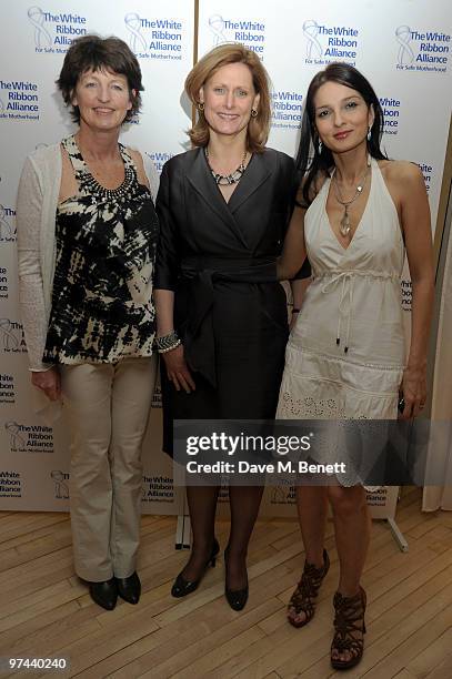 Brigid McConville, Sarah Brown and Yasmin Mills attend the private dinner for the White Ribbon Alliance's Global Dinner Party Campaign, at Agua in...