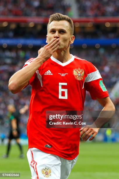 Denis Cheryshev of Russia celebrates scoring his sides fourth goal of the game during the 2018 FIFA World Cup Russia Group A match between Russia and...