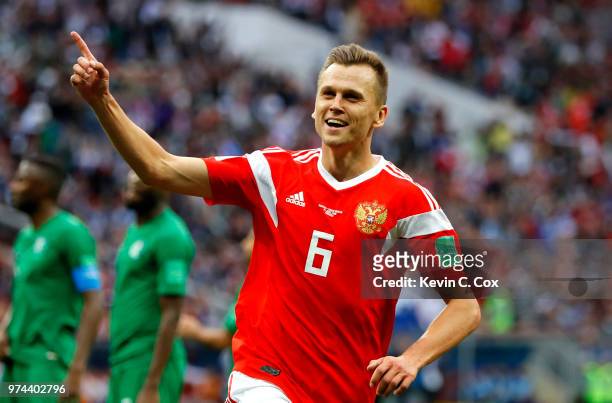 Denis Cheryshev of Russia celebrates after scoring his team's fourth goal during the 2018 FIFA World Cup Russia Group A match between Russia and...