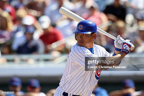 Kosuke Fukudome of the Chicago Cubs bats against the Oakland Athletics during the MLB spring training game at HoHoKam Park on March 4, 2009 in Mesa,...