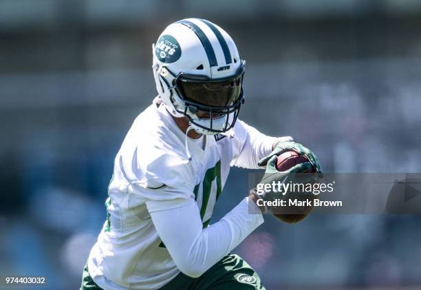 Wide receiver Jermaine Kearse of the New York Jets makes a catch in drills during the final day of Jets mandatory minicamp on June 14, 2018 at The...
