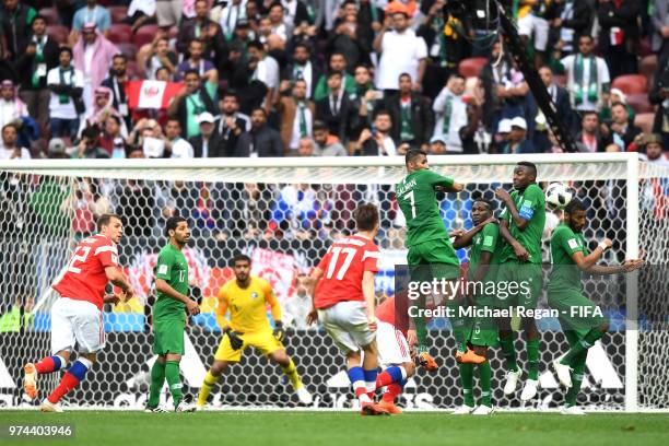 Aleksandr Golovin of Russia scores his sides fifth goal from a free kick during the 2018 FIFA World Cup Russia Group A match between Russia and Saudi...