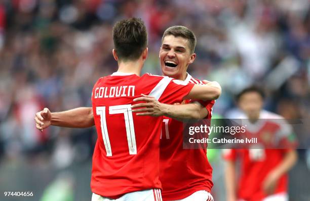 Aleksandr Golovin of Russia celebrates with team mates after scoring his team's fifth goal during the 2018 FIFA World Cup Russia Group A match...