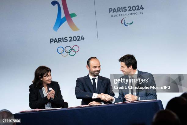 Paris Mayor Anne Hidalgo , French Prime Minister Edouard Philippe and Tony Estanguet , President of Paris 2024 attend the ceremony of signing of...