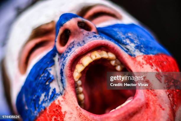 Fan of Russia celebrates after wining the game during the 2018 FIFA World Cup Russia group A match between Russia and Saudi Arabia at FIFA Fans Fest...