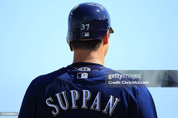 Jeff Suppan of the Milwaukee Brewers waits on third base against the San Francisco Giants during a spring training game at Scottsdale Stadium on...