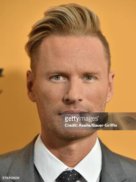 Composer Brian Tyler arrives at the premiere of Paramount Pictures' 'Yellowstone' at Paramount Studios on June 11, 2018 in Hollywood, California.