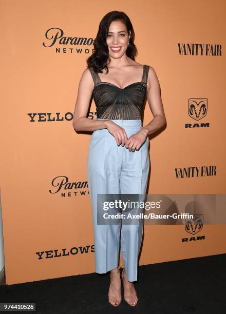 Actress Michaela Conlin arrives at the premiere of Paramount Pictures' 'Yellowstone' at Paramount Studios on June 11, 2018 in Hollywood, California.