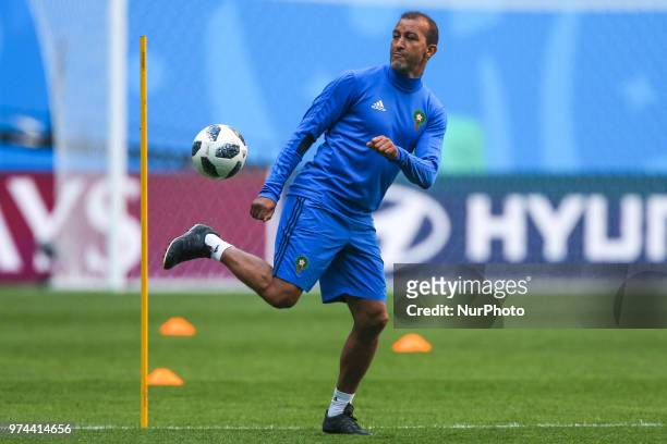 Assistant coach of the Morocco national football team takes part in a training session at Saint Petersburg Stadium in Saint Petersburg on June 14...