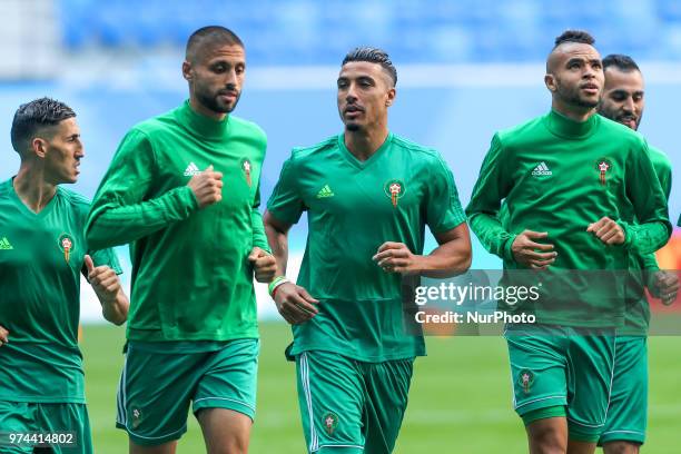 Players of the Morocco national football team takes part in a training session at Saint Petersburg Stadium in Saint Petersburg on June 14 ahead of a...