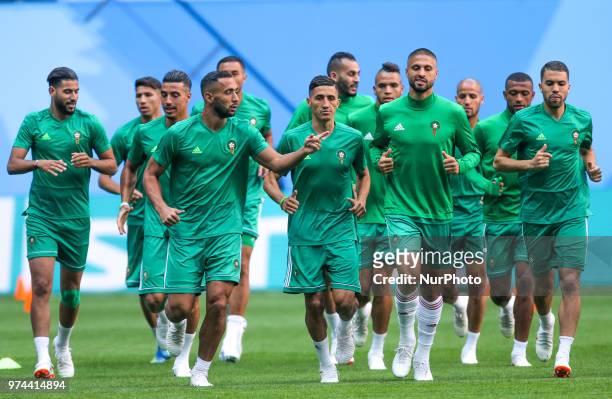 Players of the Morocco national football team takes part in a training session at Saint Petersburg Stadium in Saint Petersburg on June 14 ahead of a...