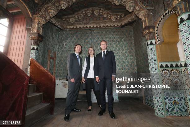 French President Emmanuel Macron , his cultural special adviser and French TV host Stephane Bern and French Culture Minister Francoise Nyssen visit...