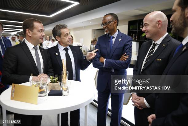 Russian Prime Minister Dmitry Medvedev, French former president Nicolas Sarkozy, Rwanda's President Paul Kagame, FIFA president Gianni Infantino and...