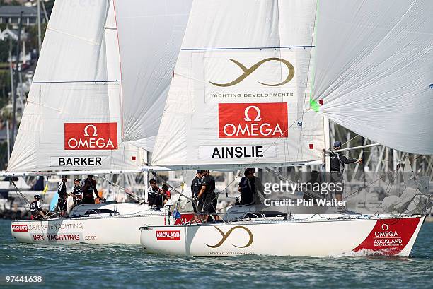 Ben Ainslie of Great Britain leads Dean Barker of New Zealand to the finish line during the Omega Auckland Yacht Racing Regatta held on the Waitemata...