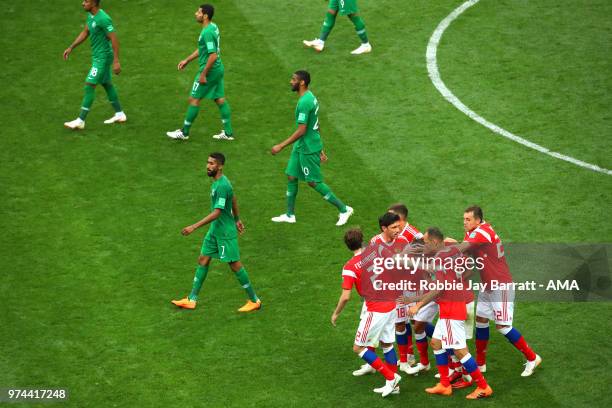 Aleksandr Golovin of Russia celebrates scoring a goal to make it 5-0 with his team-mates during the 2018 FIFA World Cup Russia group A match between...