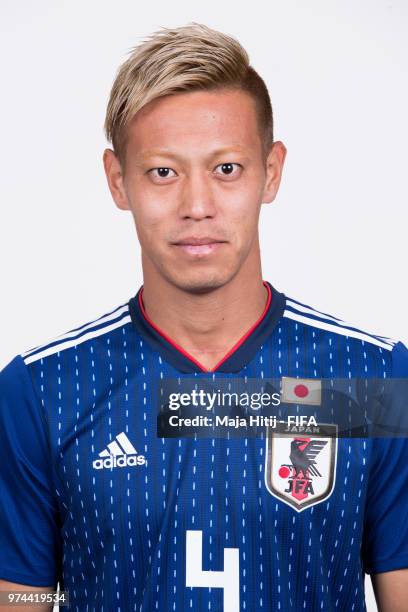 Keisuke Honda of Japan poses for a portrait during the official FIFA World Cup 2018 portrait session at the FC Rubin Training Grounds on June 14,...