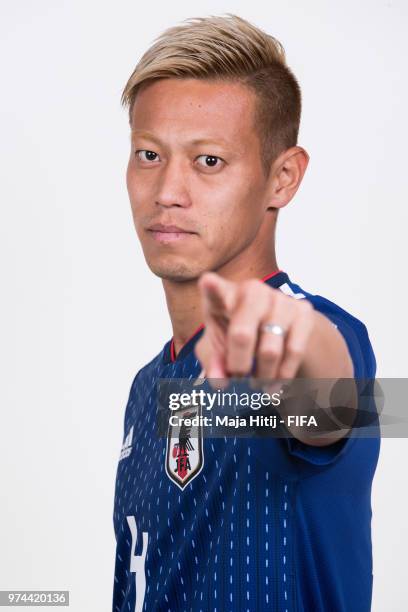 Keisuke Honda of Japan poses for a portrait during the official FIFA World Cup 2018 portrait session at the FC Rubin Training Grounds on June 14,...