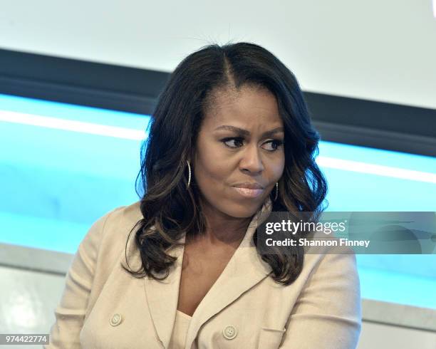 Former First Lady Michelle Obama talks to the audience at the Reach Higher Initiative Beating the Odds Summit to support first-generation...