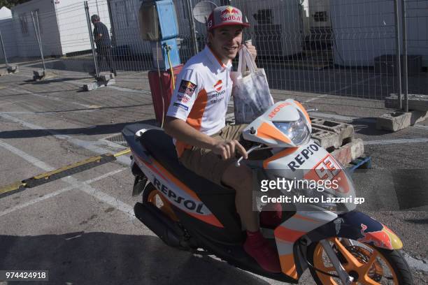 Marc Marquez of Spain and Repsol Honda Team rides the scooter in paddock during the MotoGp of Catalunya - Previews at Circuit de Catalunya on June...